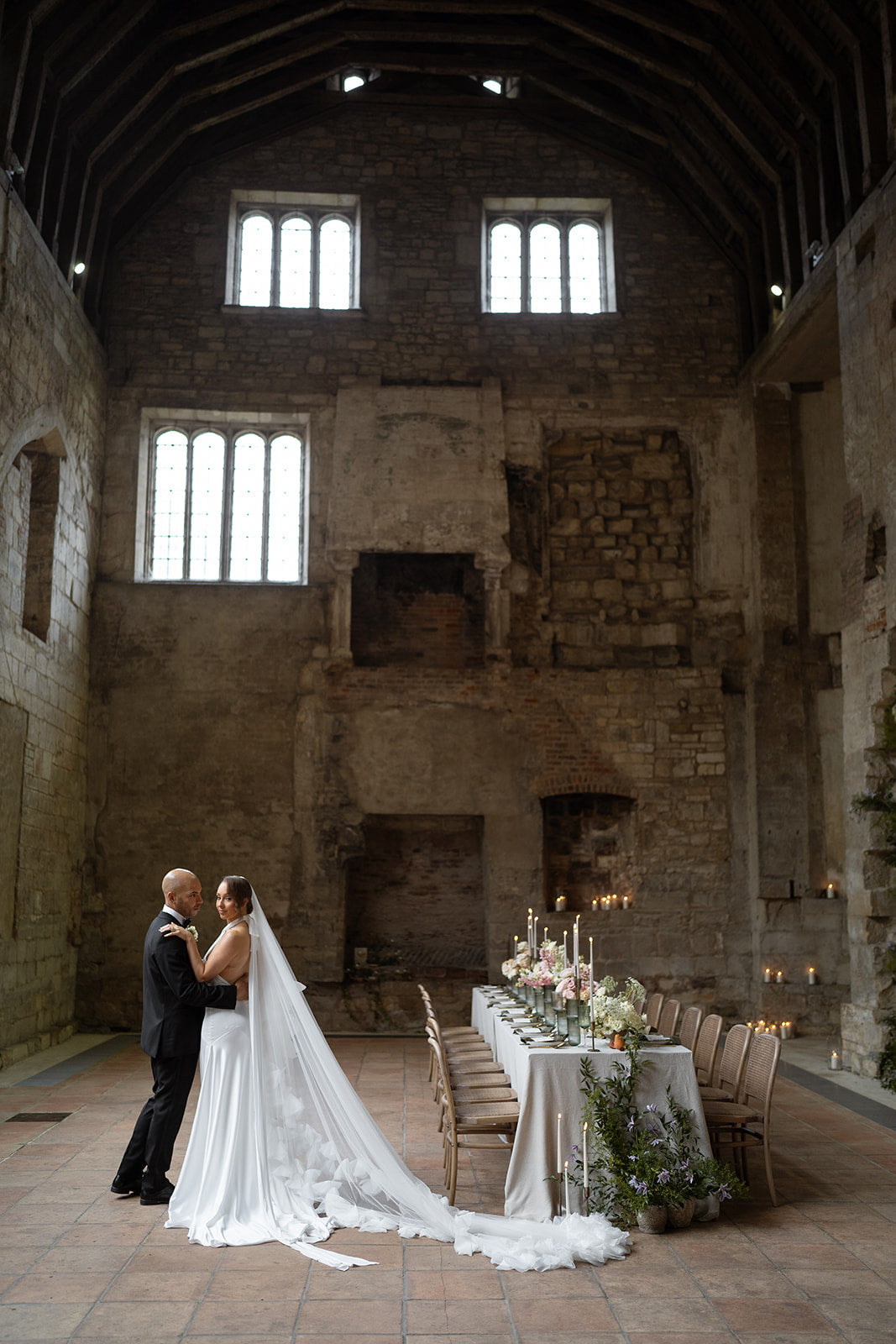 What a Host Home: Wedding Tablescape with gold cutlery, linen table napkins, porcelain round plates, gold candle holders