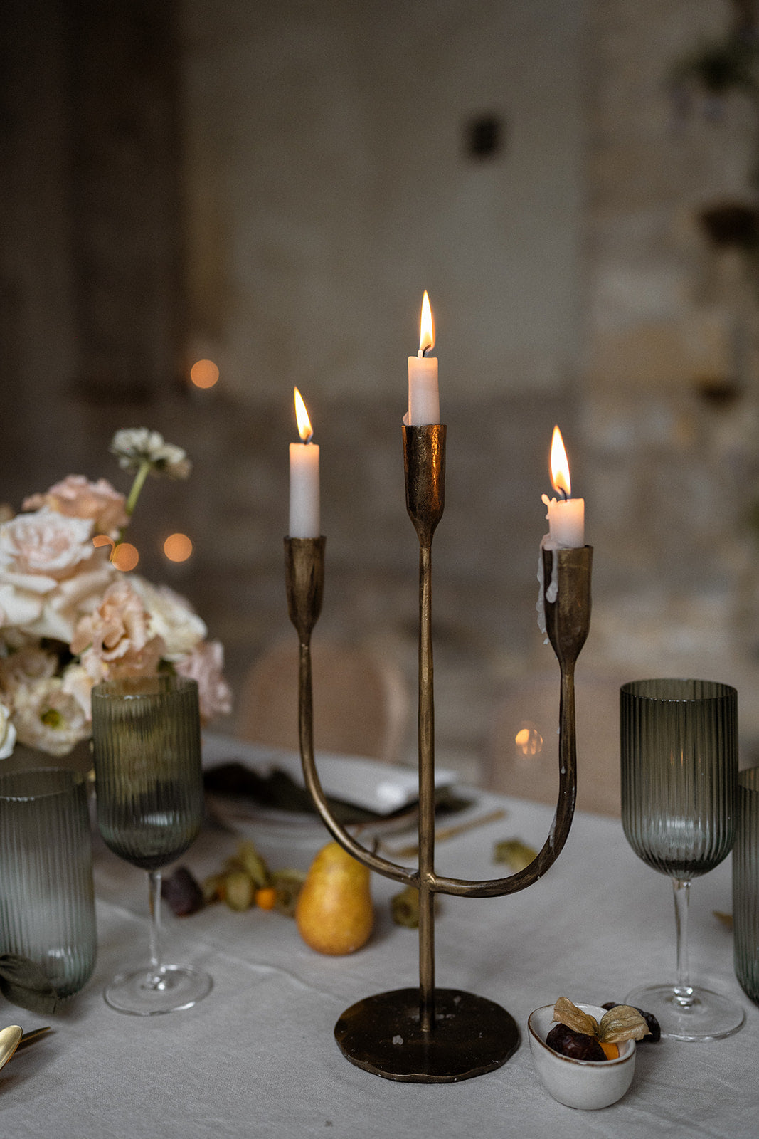 What a Host Home: Wedding Tablescape with gold cutlery, linen table napkins, porcelain round plates, gold candle holders