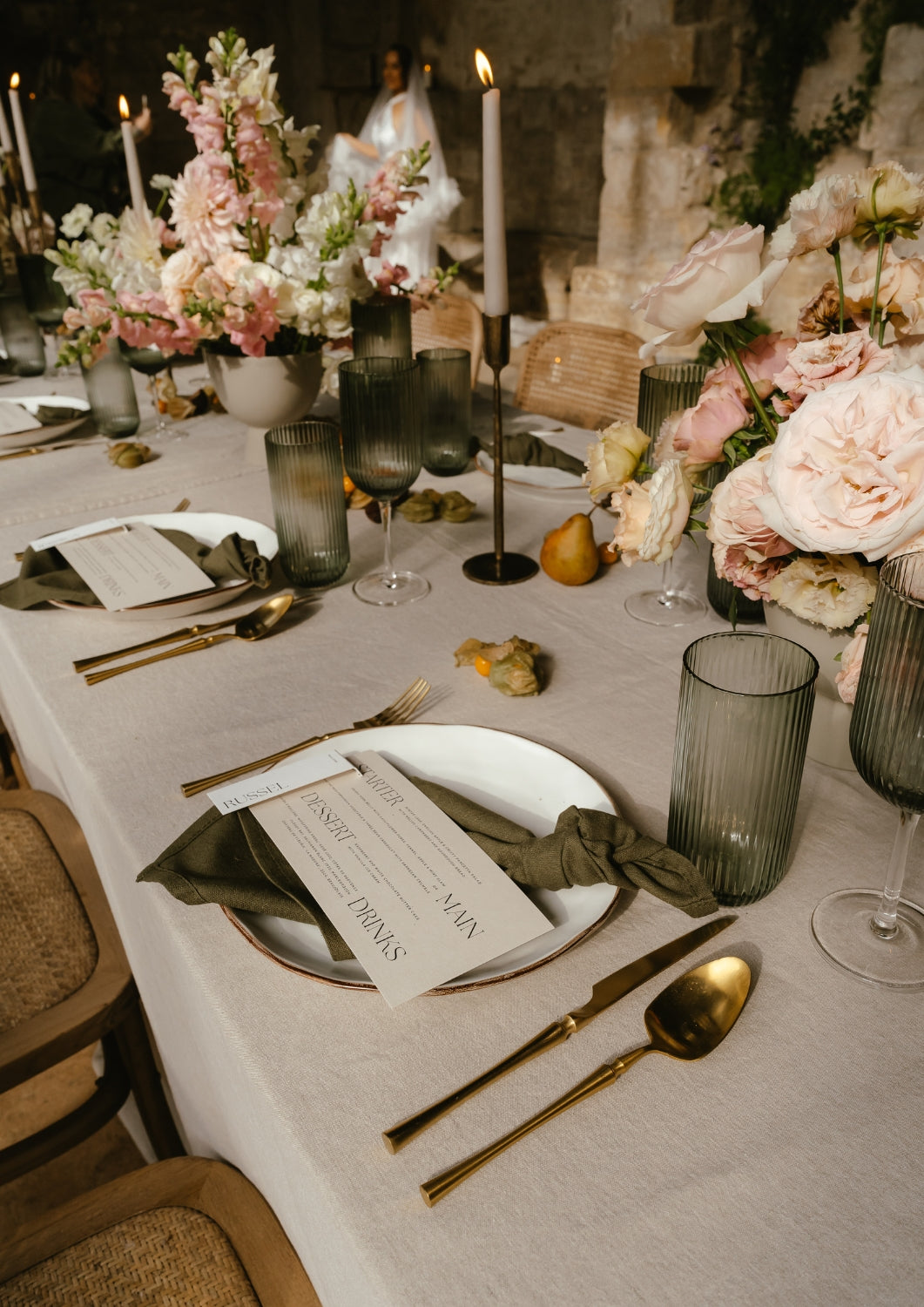 What a Host Home: Modern Wedding tablescape with gold cutlery, round porcelain plates and gold rustic iron candle hodlers