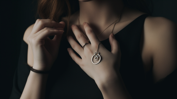Person stylishly wearing jewelry adorned with irrational symbols, integrating symbolic pieces into everyday life.