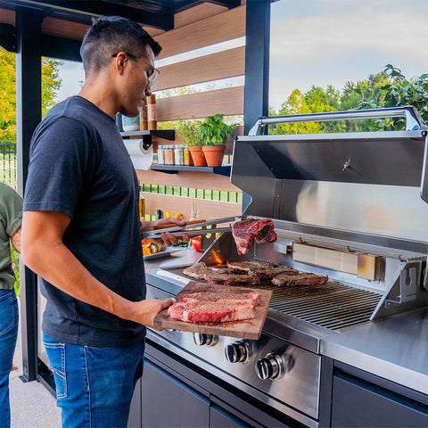 grilling in outdoor kitchen