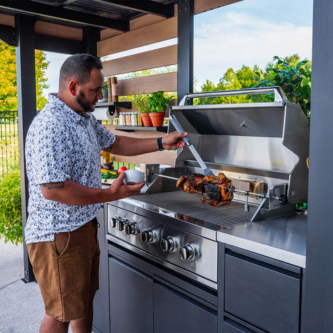 grilling on backyard discovery outdoor kitchen