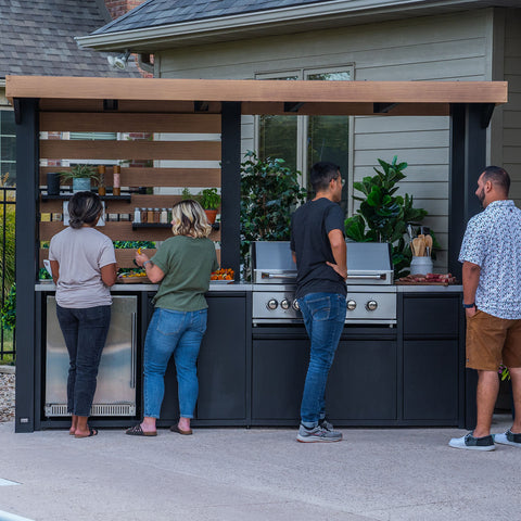 Outdoor gathering around bbq kitchen