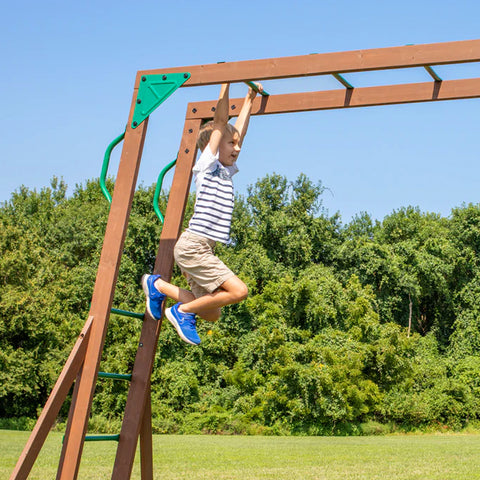 child on monkey bars