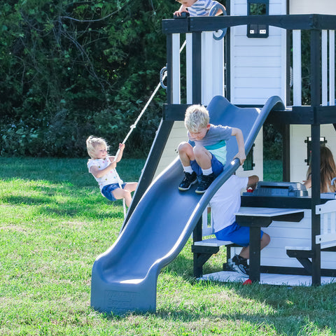 child on wave slide