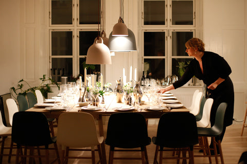 woman setting a holiday table