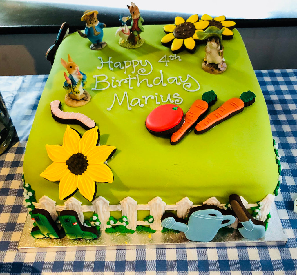 Photograph of green birthday cake.