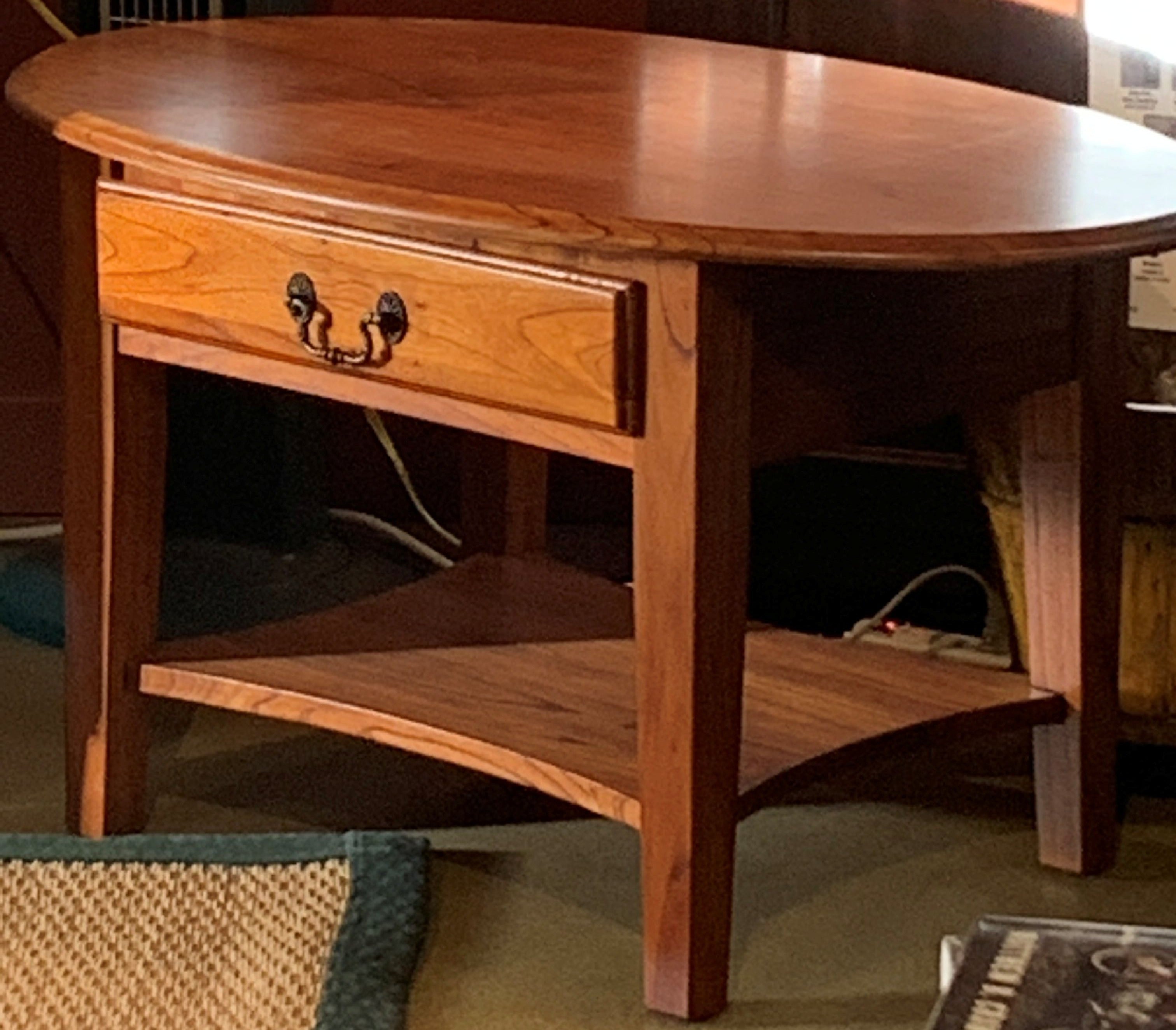 Small Oval Coffee Table With Drawer Chestnut Finish Showroom Model Endicott Home Furnishings