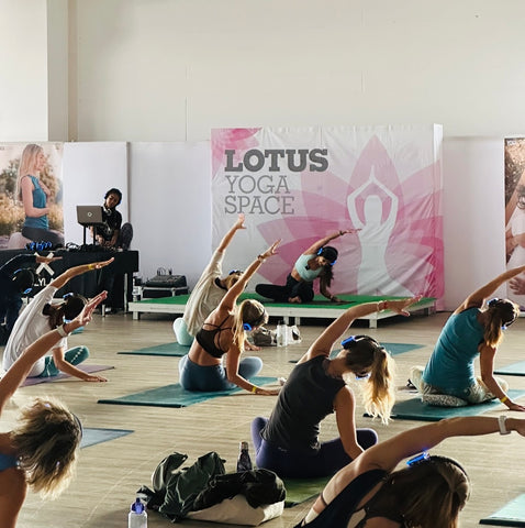 Jodie Roberts teaching Silent Yoga Disco in Wellicious Bra!