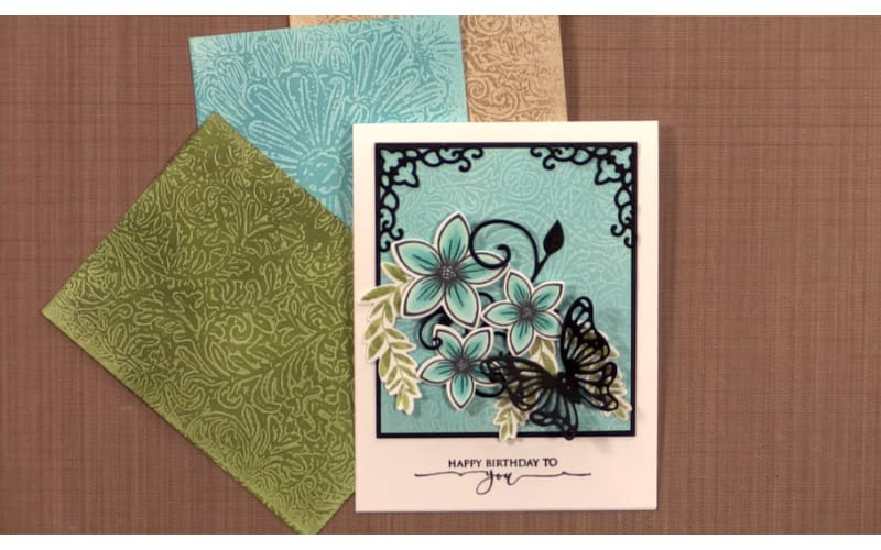 card backgrounds made from wax paper embossing and a finished card