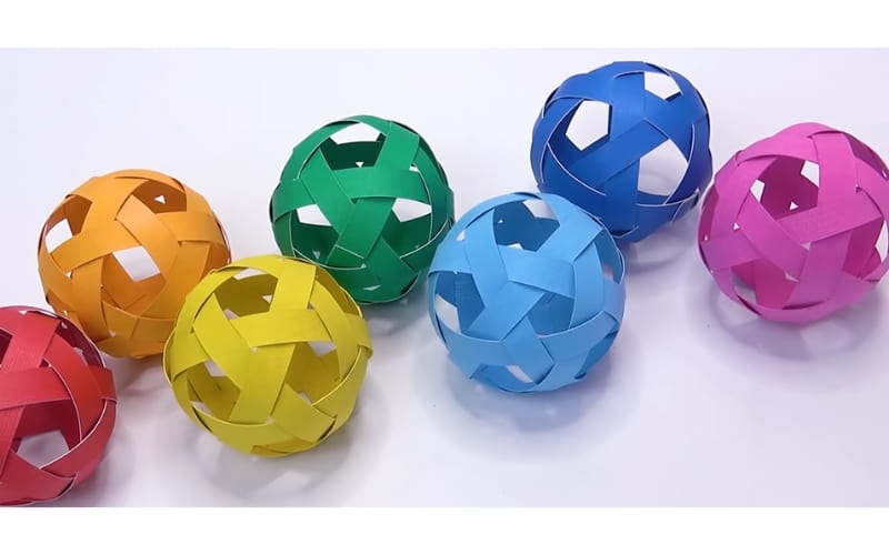 Colorful construction paper balls to use as decors