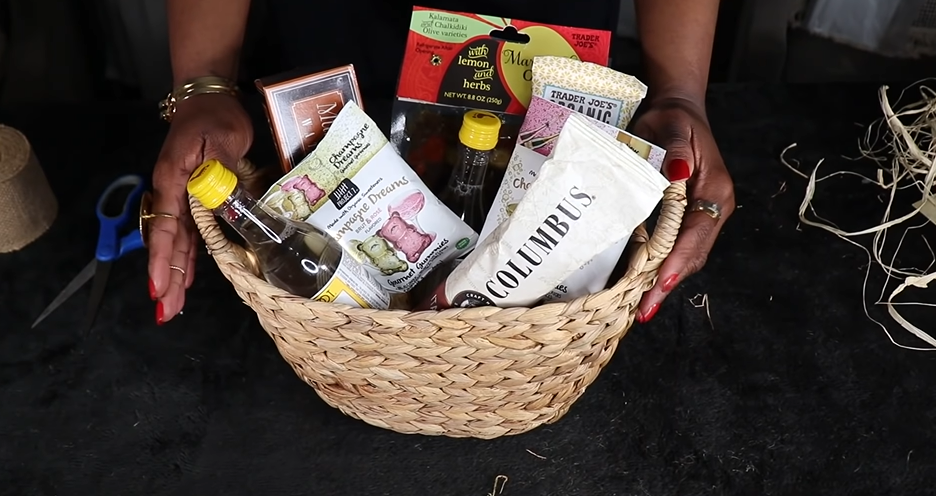 picnic-themed gift basket filled with essential picnic treats