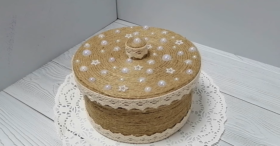 recycled cardboard box covered with jute rope for a fun gift basket