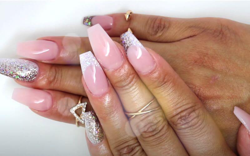 nails with a pink and silver polish