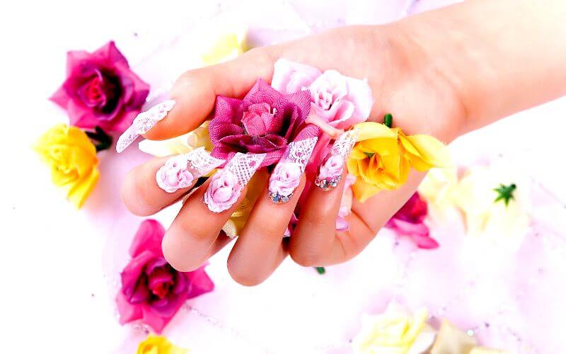 a woman's nail designed with nail art