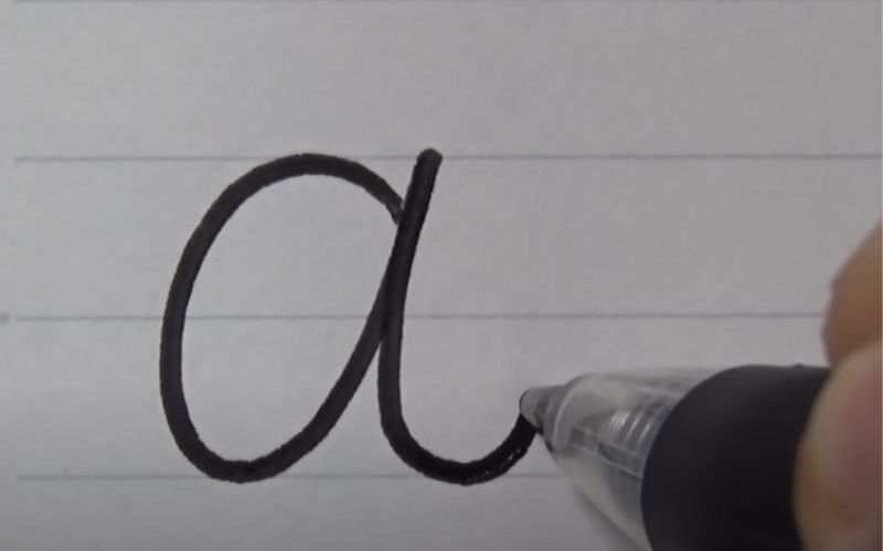 letter “a” written on a paper