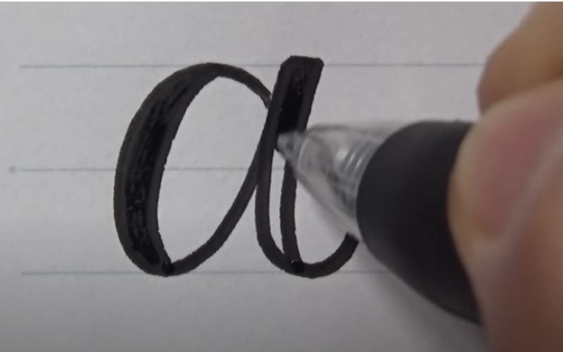  a letter “a” written o a paper