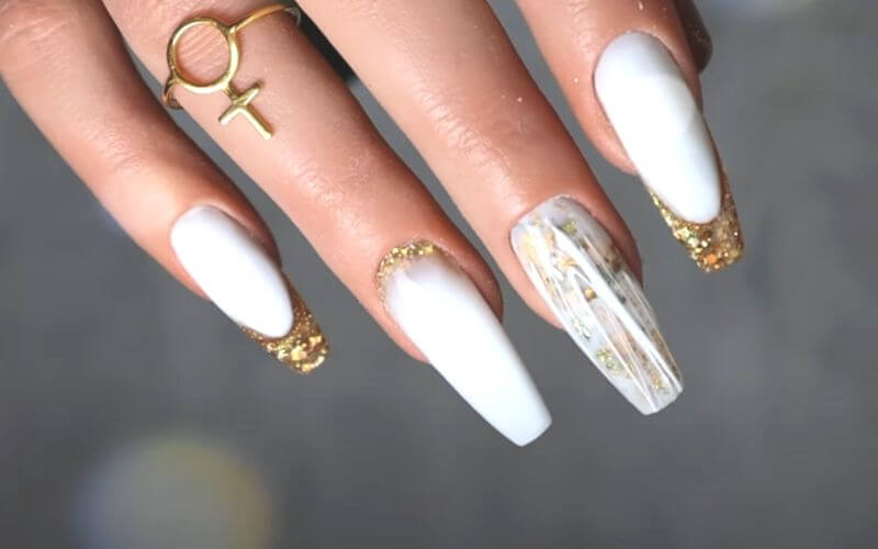 nails with white and gold polish
