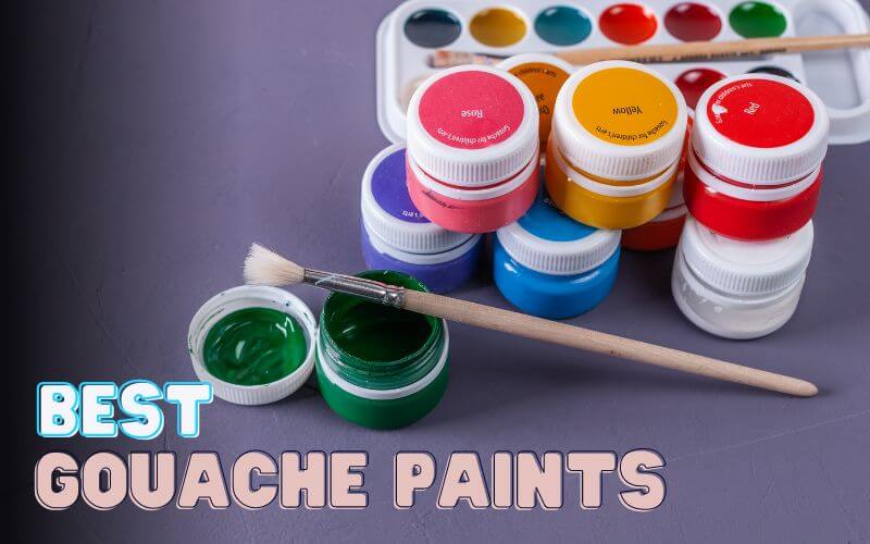Gouache paints on a lavender surface