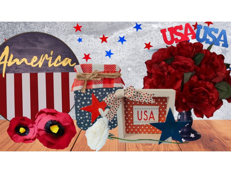 various Memorial Day paper crafts arranged on a table with a star backdrop