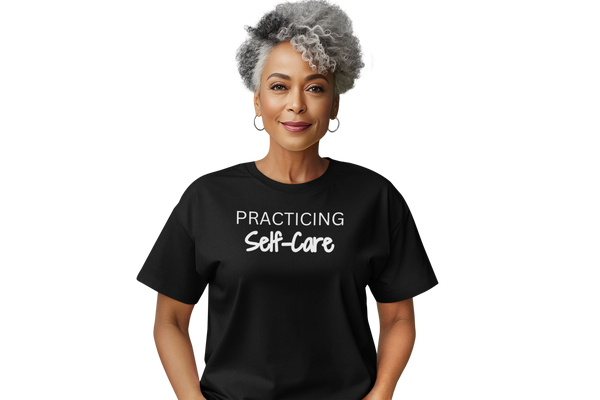 Woman wearing a Practicing Self-Care T-shirt