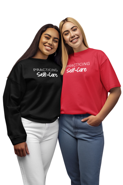 Two women wearing Practicing Self-Care apparel because self-care is for everyone