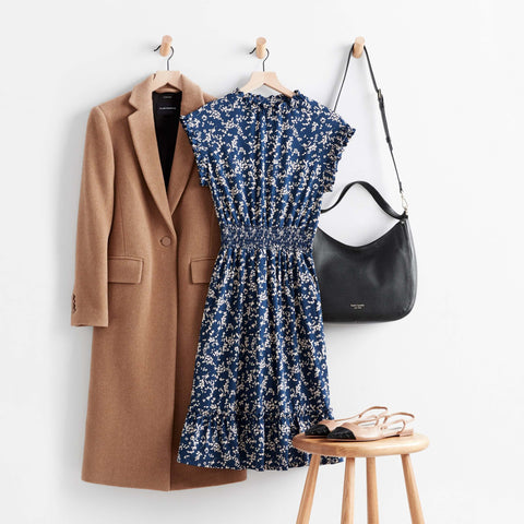 Brown trench coat, blie floral dress, black sling bag and brown kitten shoes