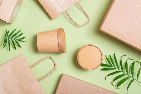 Paper packaging on a soft green background