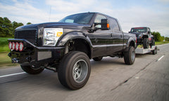 lifted f250 towing trailer