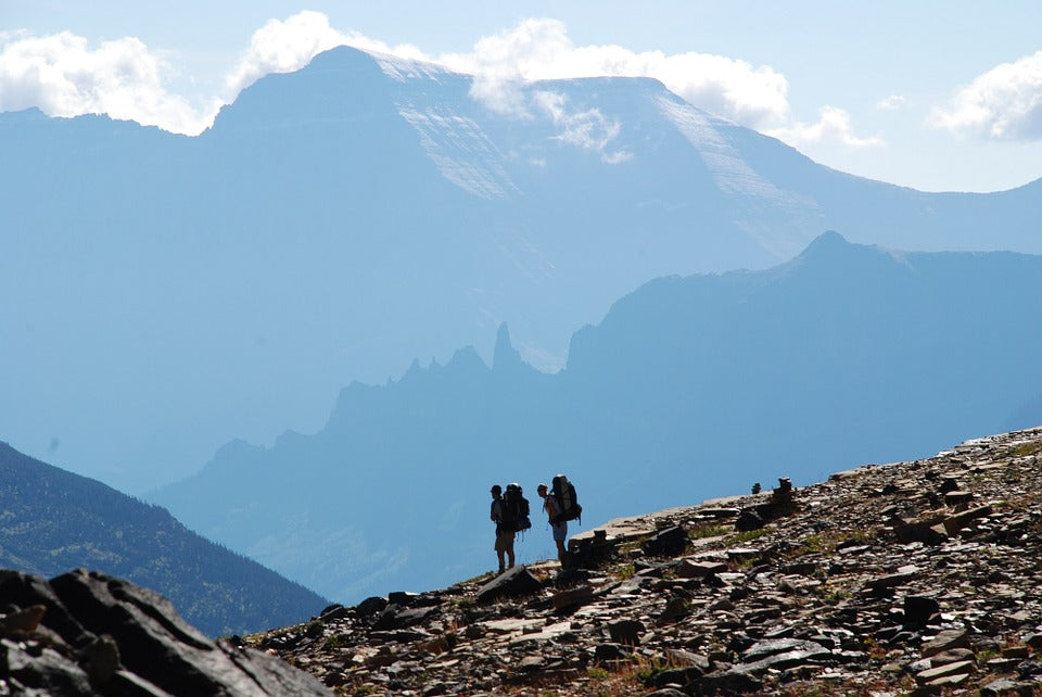 Two backpackers on a rocky mountain