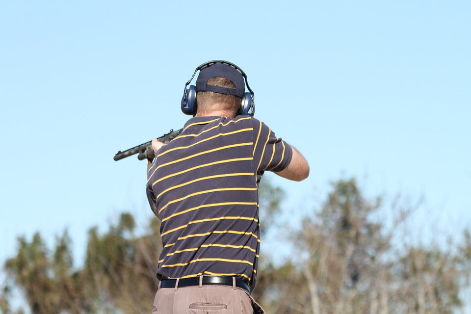 A clay pigeon shooter in competition