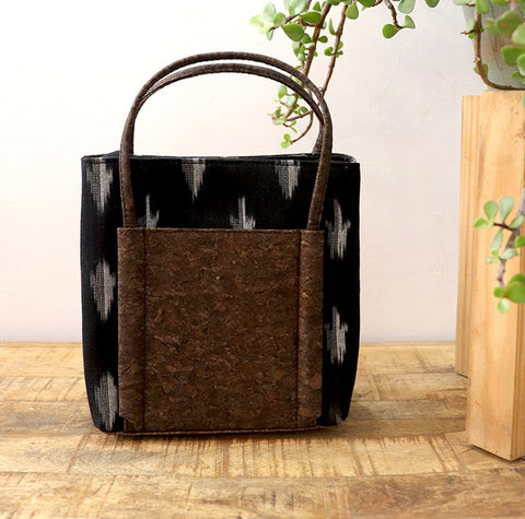 Black Vegan Leather and Ikat Weave Hand Bag cum Sling by Kirgiti Designs now available at Trendroots