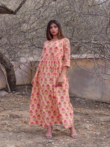 Enchanting Florals Peach Cotton Hand Block Printed Gown by Chokhi Bandhani now available at Trendroots