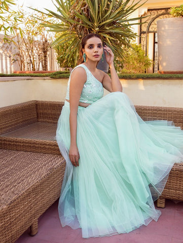 Mint Green One Shoulder Blouse with Tulle Lehenga Skirt (Set of 2) by Shrena Hirawat now available at Trendroots