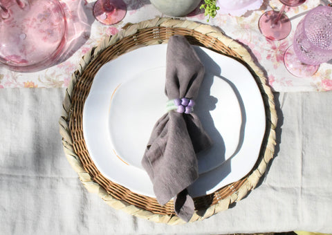 easter tablescape with layering charger, plates and napkins