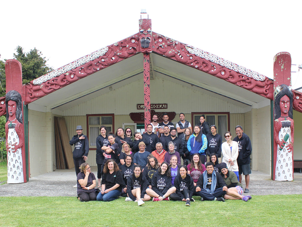 Te Tohu Paetahi full immersion Māori class in front of marae