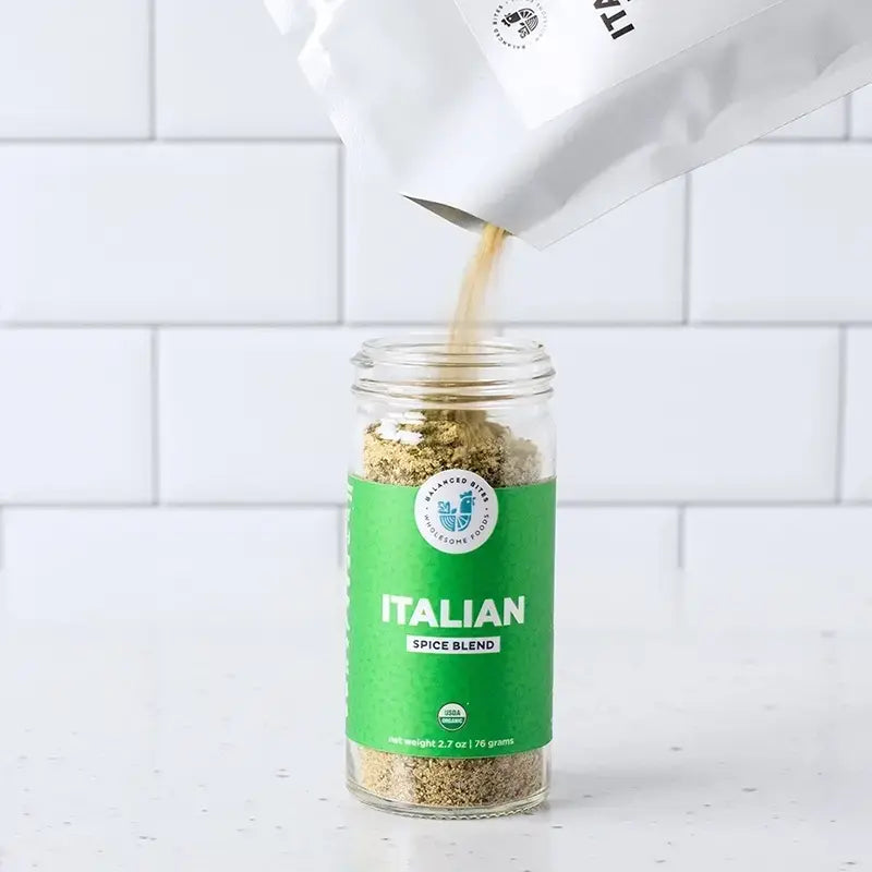 https://cdn.shopify.com/s/files/1/0548/8695/7256/products/BALANCED-BITES-ITALIAN-SPICE-BLEND-REFILL-pour.webp?v=1657031442