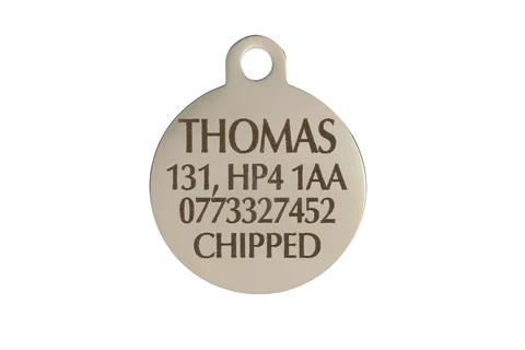 round-engraved-dog-id-tag-showing-what-details-should-be-engraved-including-the-word-chipped