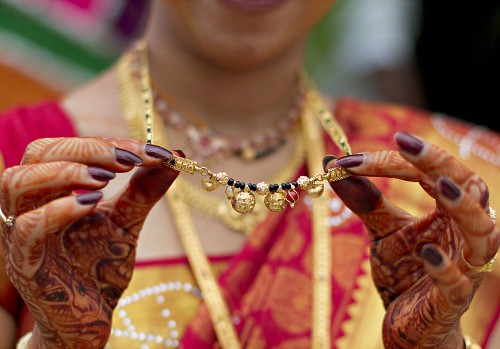 Indian Bride With Henna Hands Mehndi Showing Mangalsutra