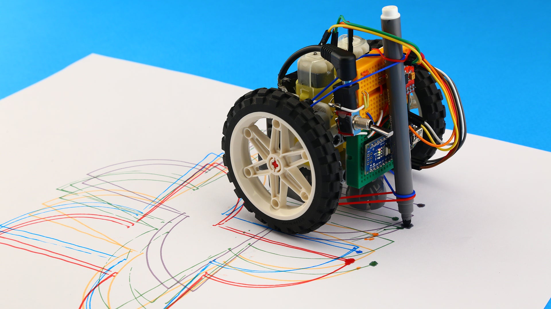 Kids love drawing with tangible coding robot