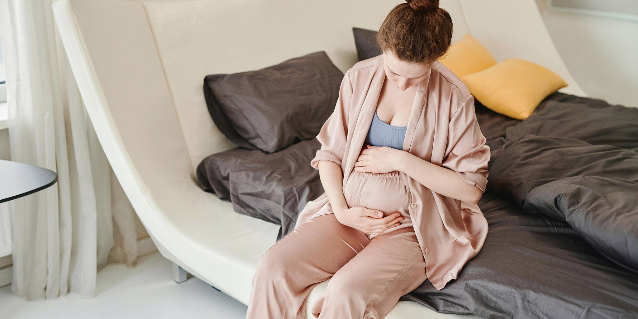 Pregnant woman in lounge clothes