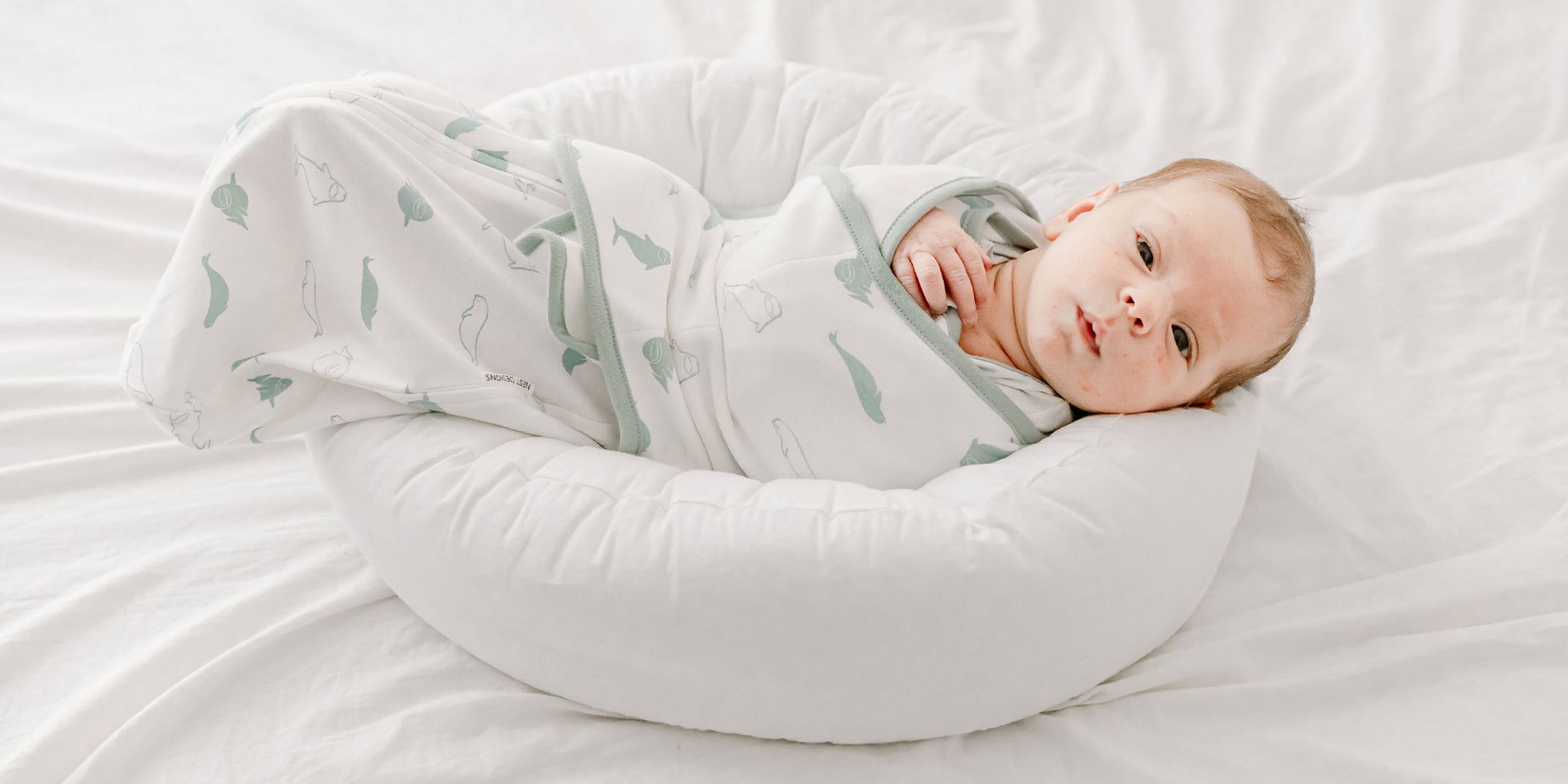How to swaddle a baby with Nest Designs