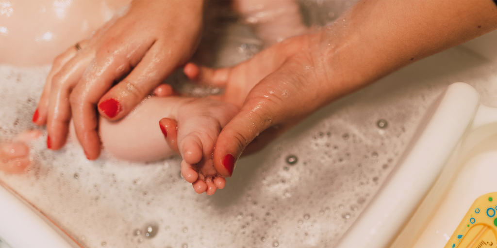 Washing a baby's foot
