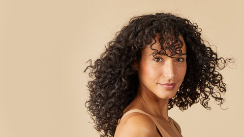 woman with beautifully defined curly hair