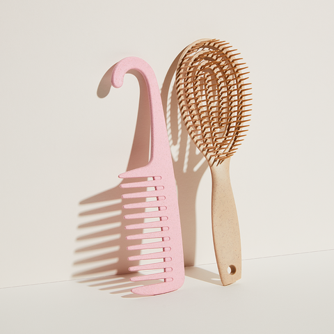Bouclème's detangling wet brush and wide tooth comb