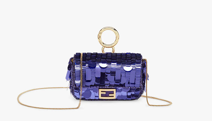 THE STORY OF THE FENDI BAGUETTE