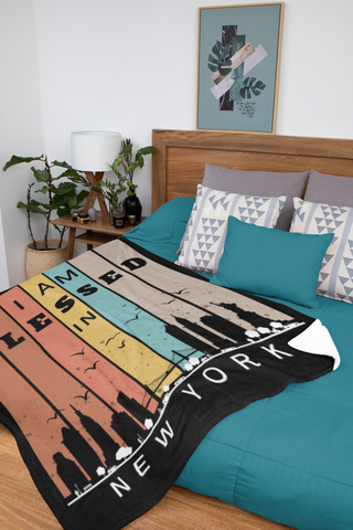 I am blessed in New York Skyline Throw Blanket on the bed