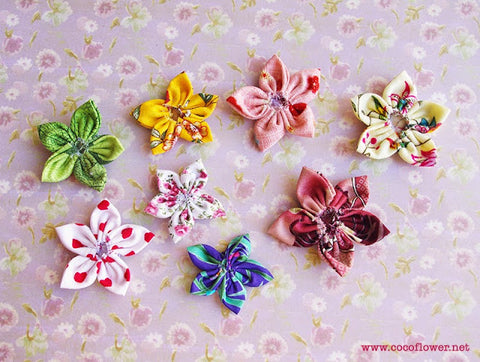 "From circles to blossoms, learn the art of fabric flower-making with this easy tutorial. 🌺 #CreativeCrafting"