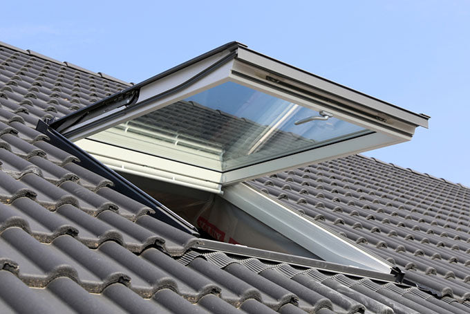 an outside view of a skylight on a residential roof