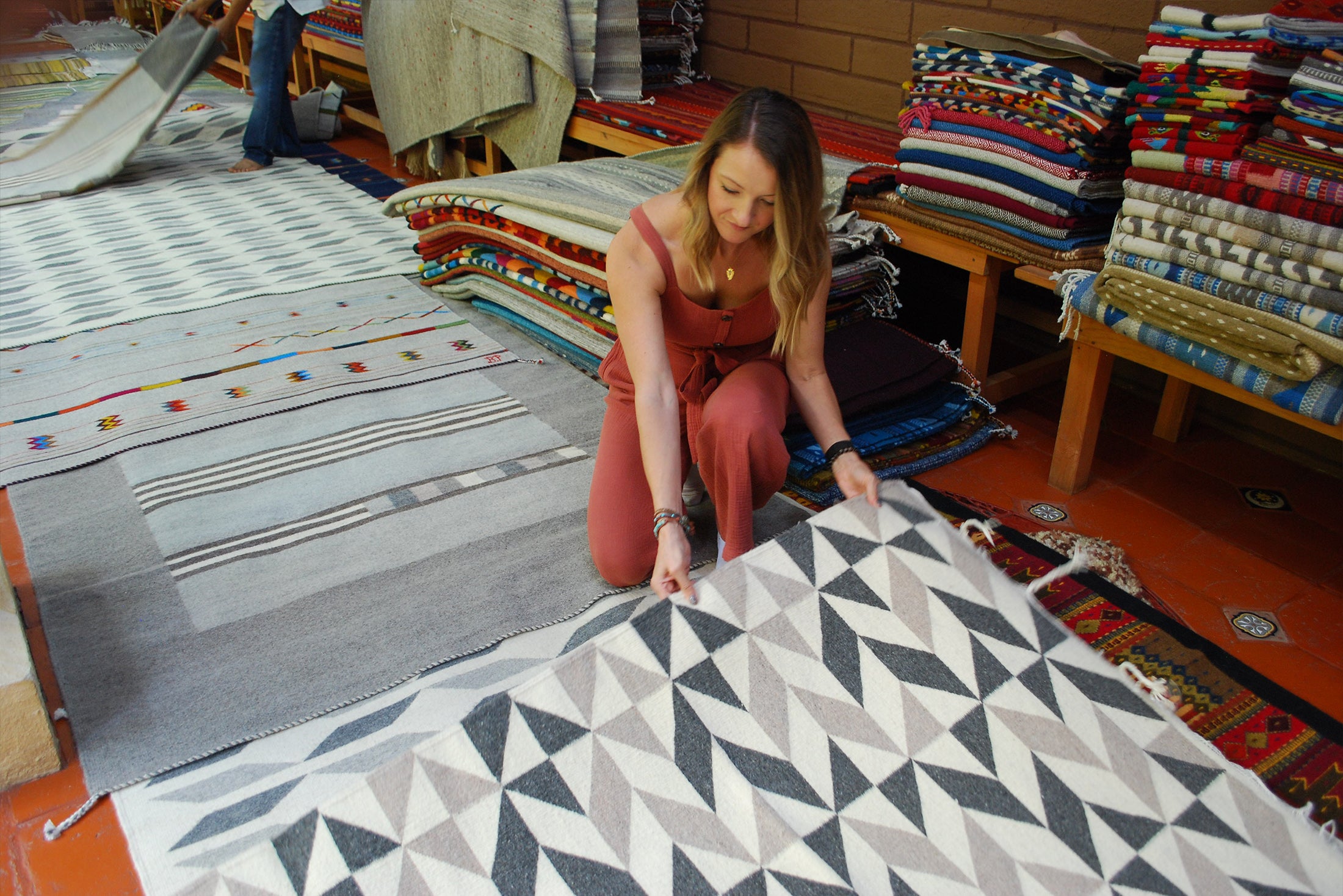 Elysian Collective Founder Jamie Williams in Oaxaca, Mexico sourcing rugs